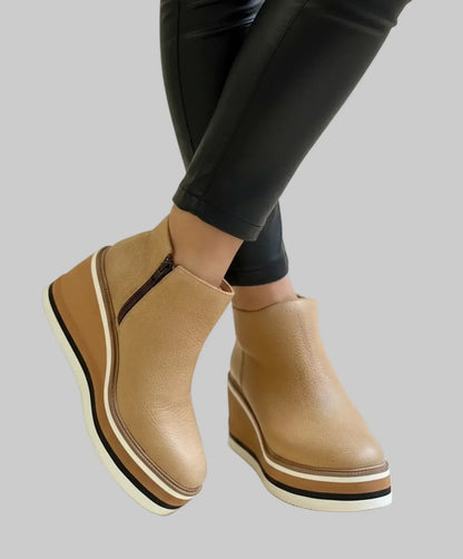 Wedge ankle boots with zip fastening
