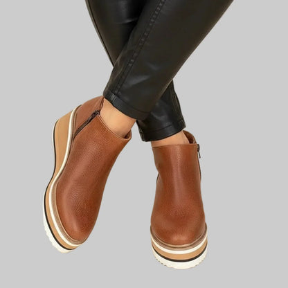 Wedge ankle boots with zip fastening