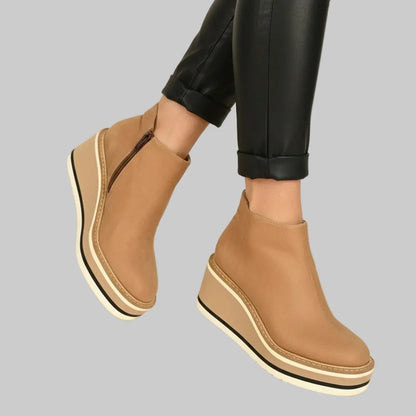 Wedge ankle boots with zip fastening