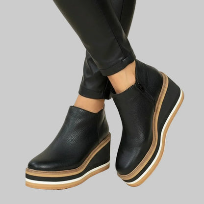 Wedge ankle boots with zip fastening